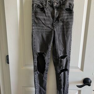 Women's Distressed Black Levi Jeans